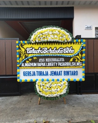 Papan Bunga Duka di Pangale